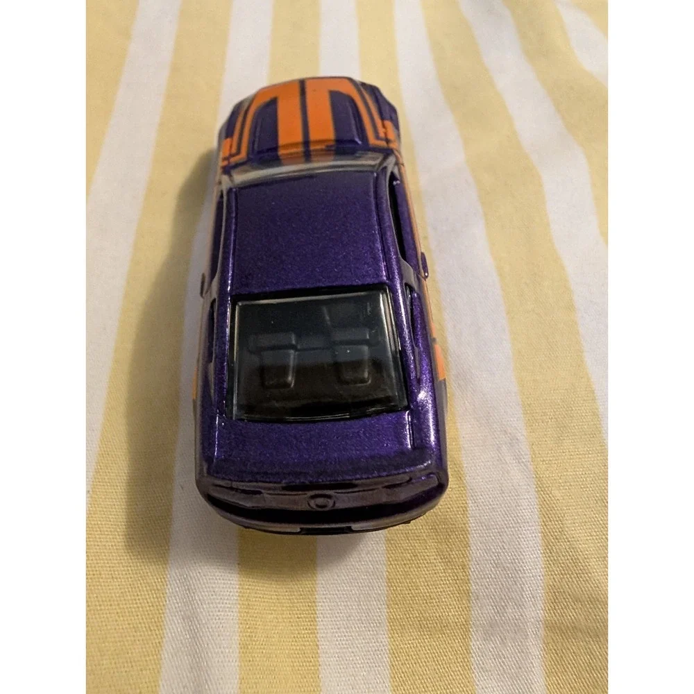 2010 Hot Wheels Ford Mustang GT Purple Diecast Toy Car 1:64 Scale